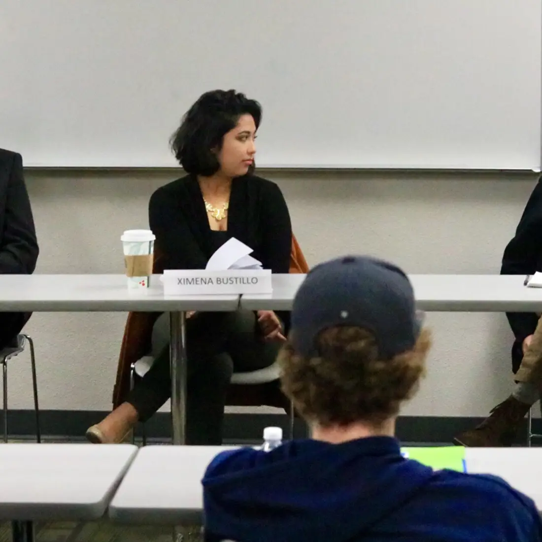 Panel of media professionals speak to students. 