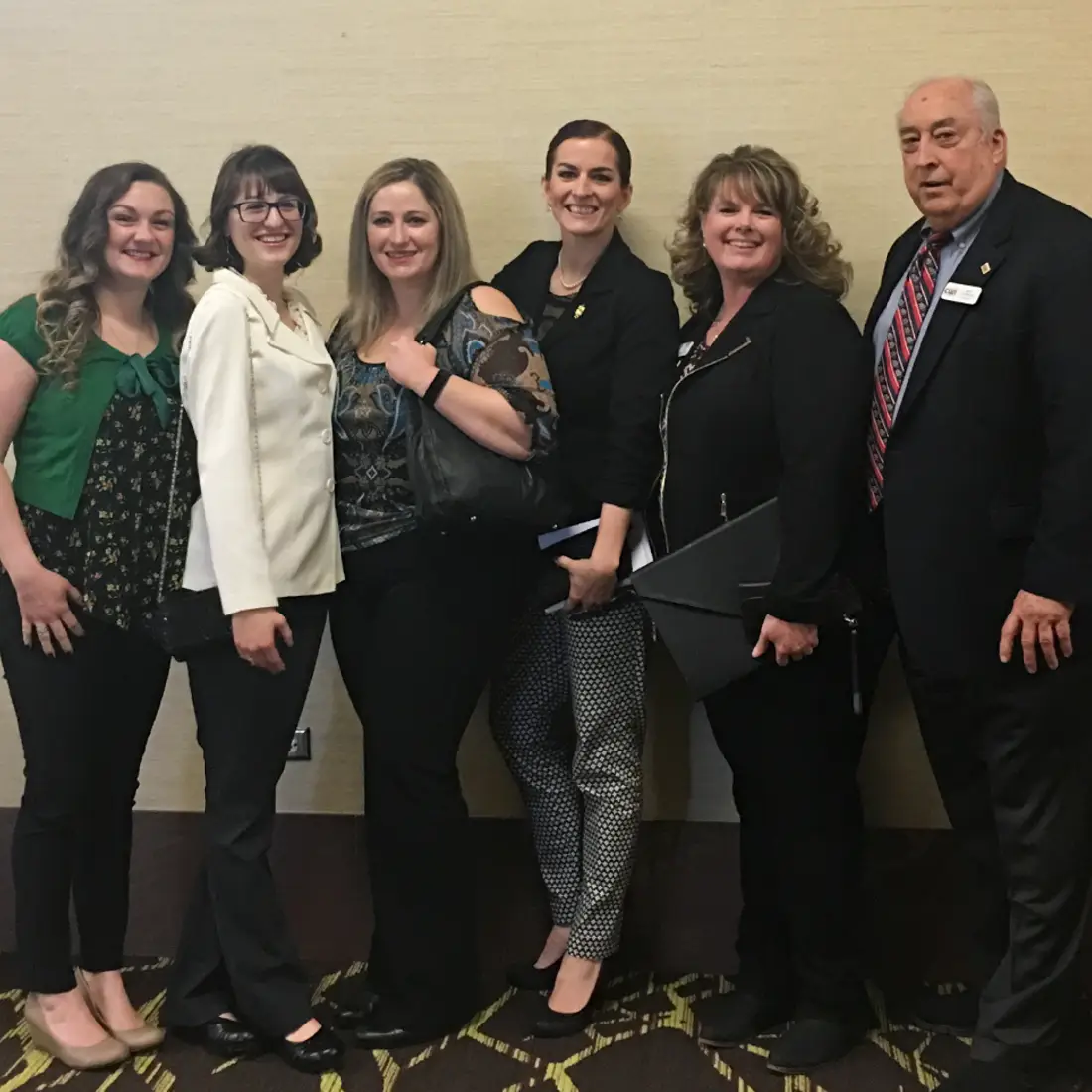 Members of Beta Sigma Pi with President Bert Glandon at annual Community College Luncheon