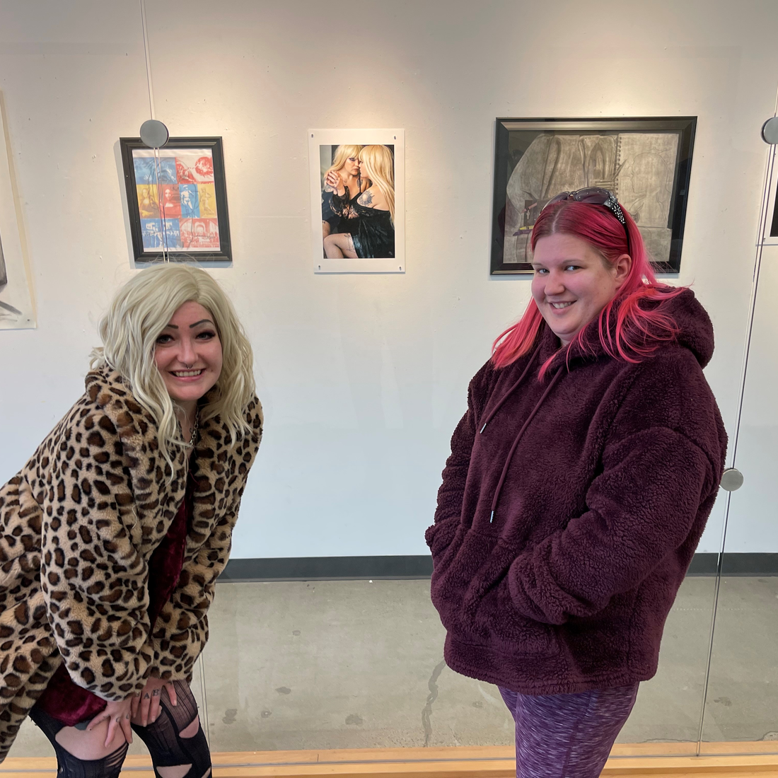 2022 Juried Art Exhibition winner, Christy Runion, right, alongside the model for her photography submission on display at the N