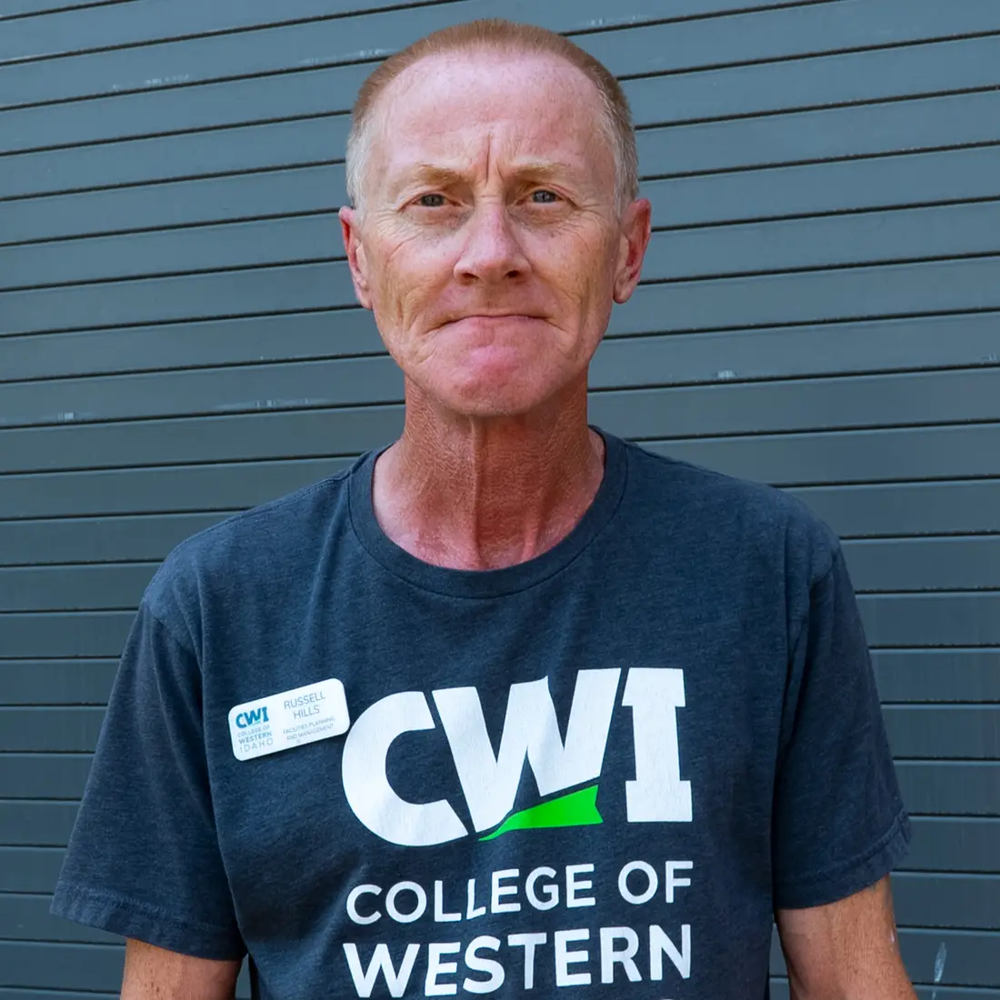 A portrait of Russell Hills.