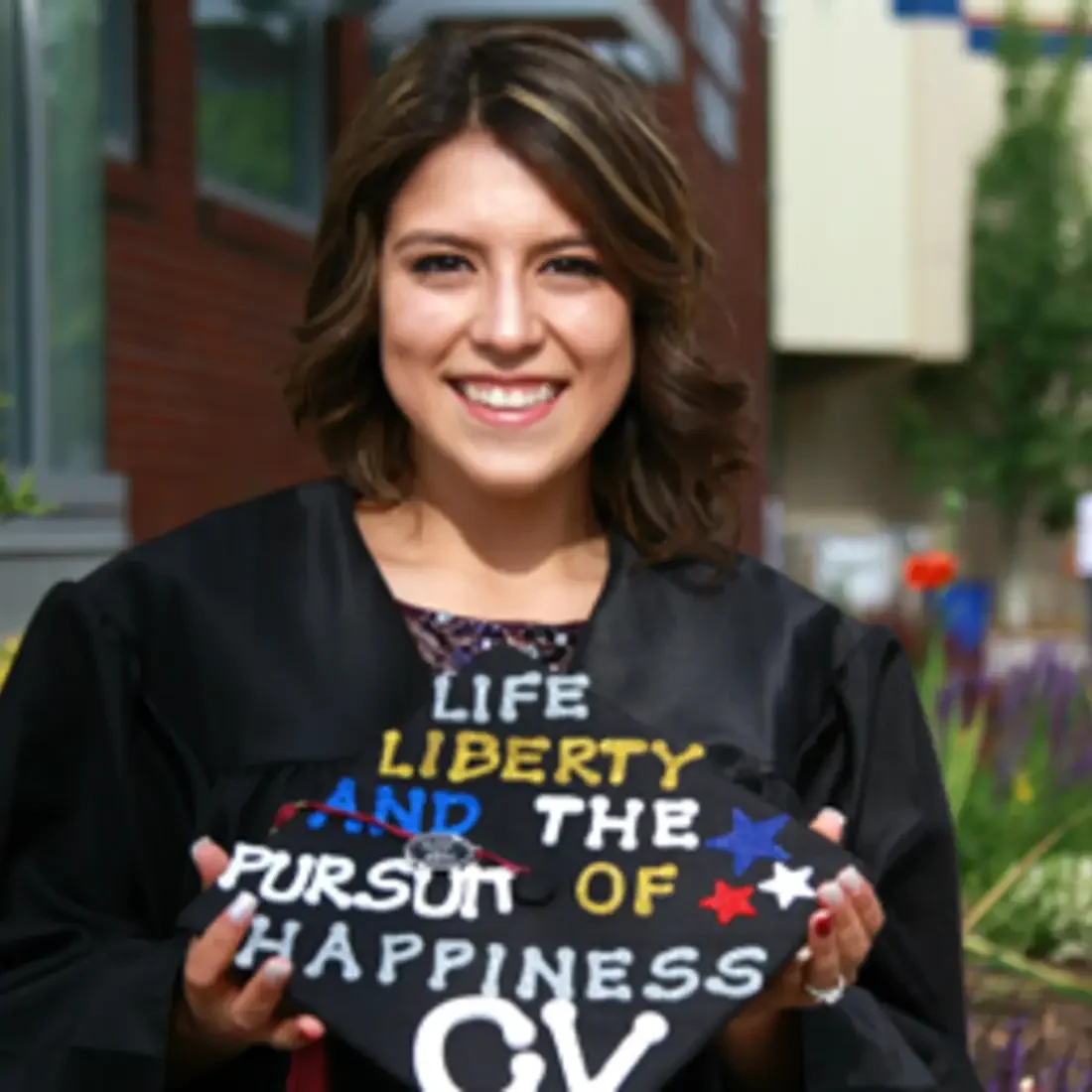 Graduate with her decorated cap