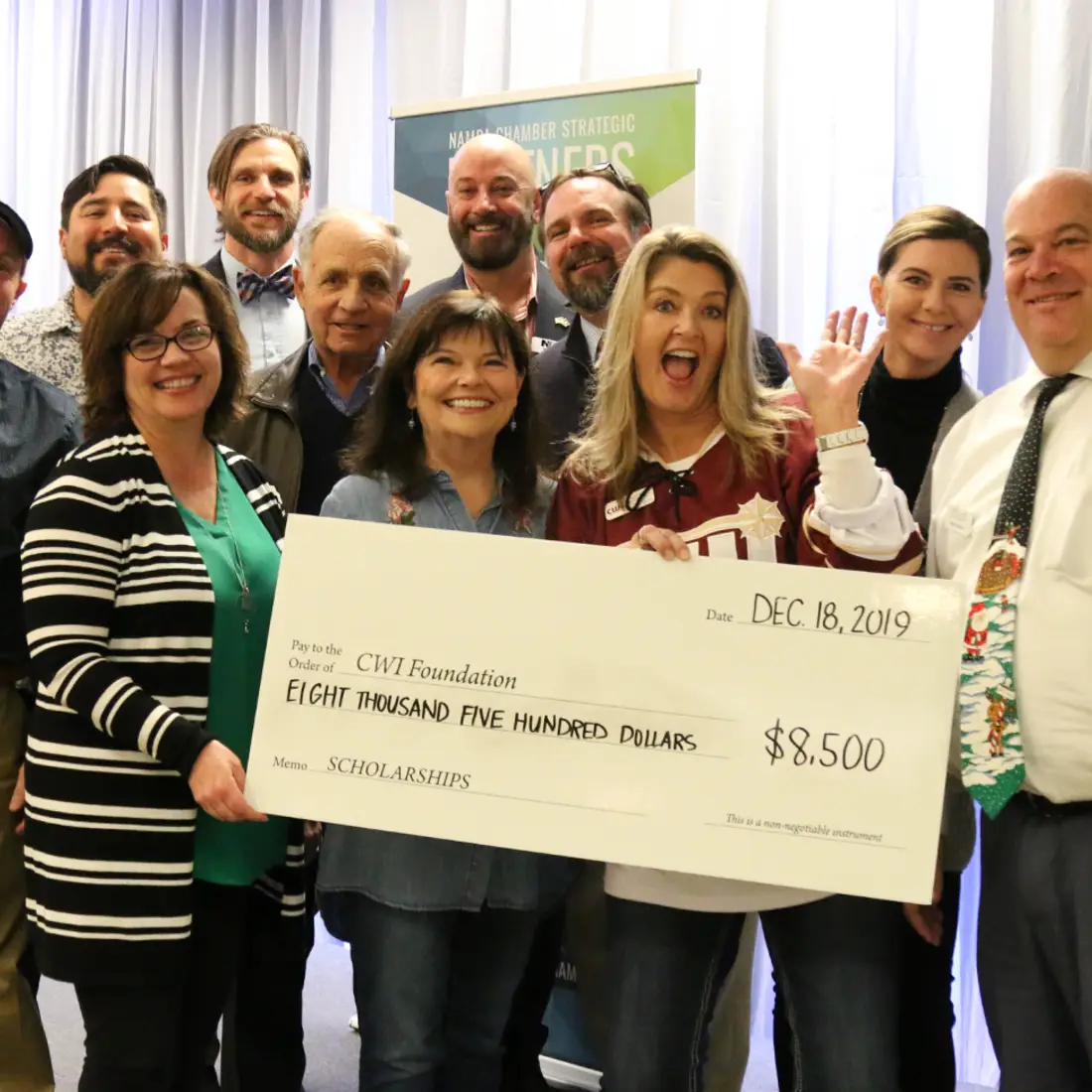 CWI representatives and members of the CWI Foundation Board and Board of Trustees pose with check for CWI Foundation