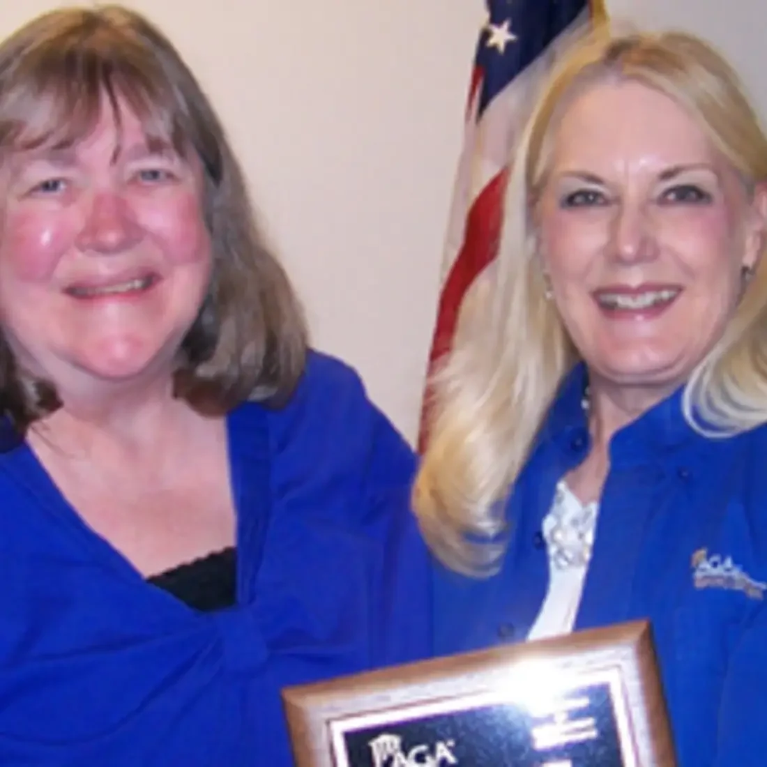 Shannon Chapman (left) is presented the Chapter Service Award.