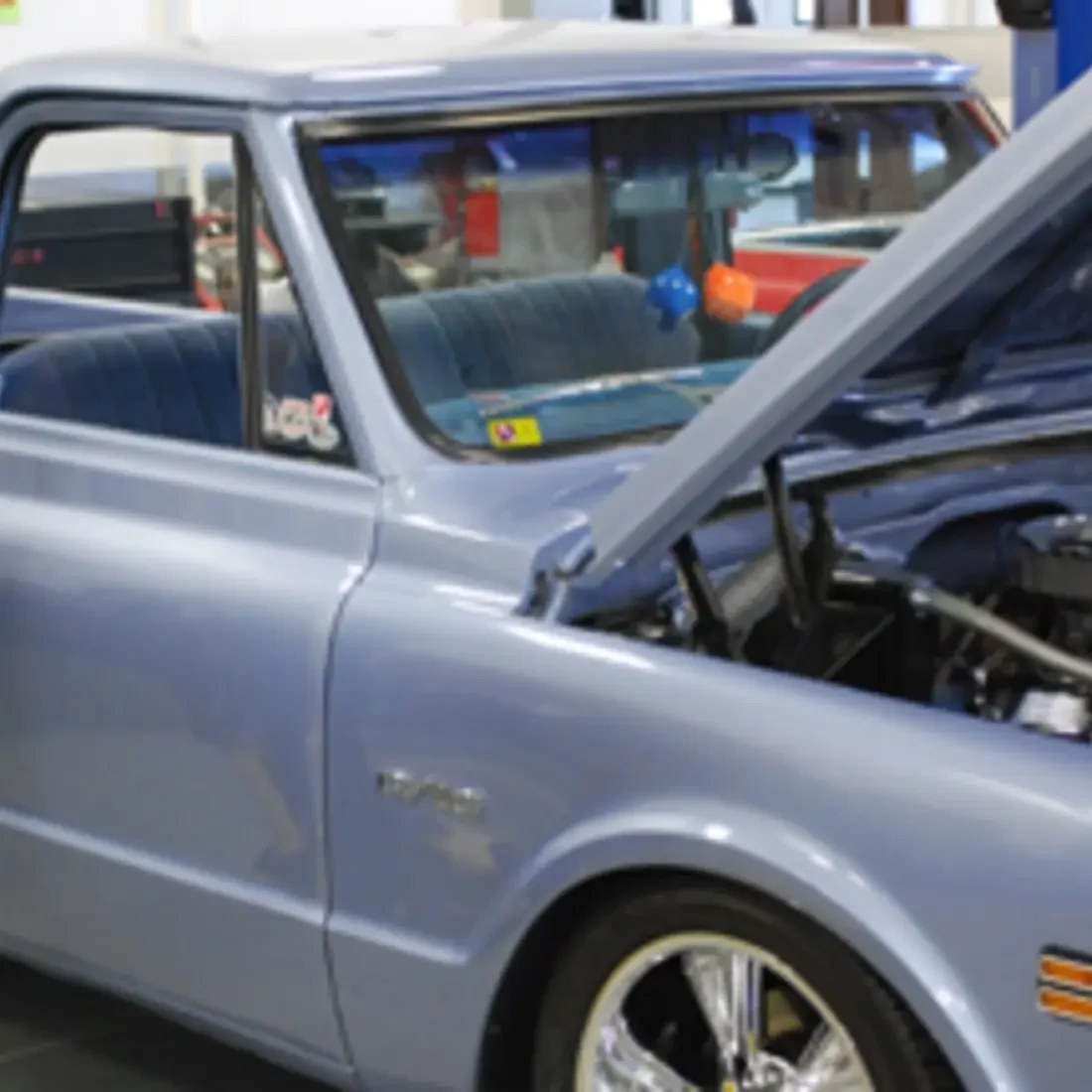 Close up of truck being worked on for Skills on Wheels Car Show