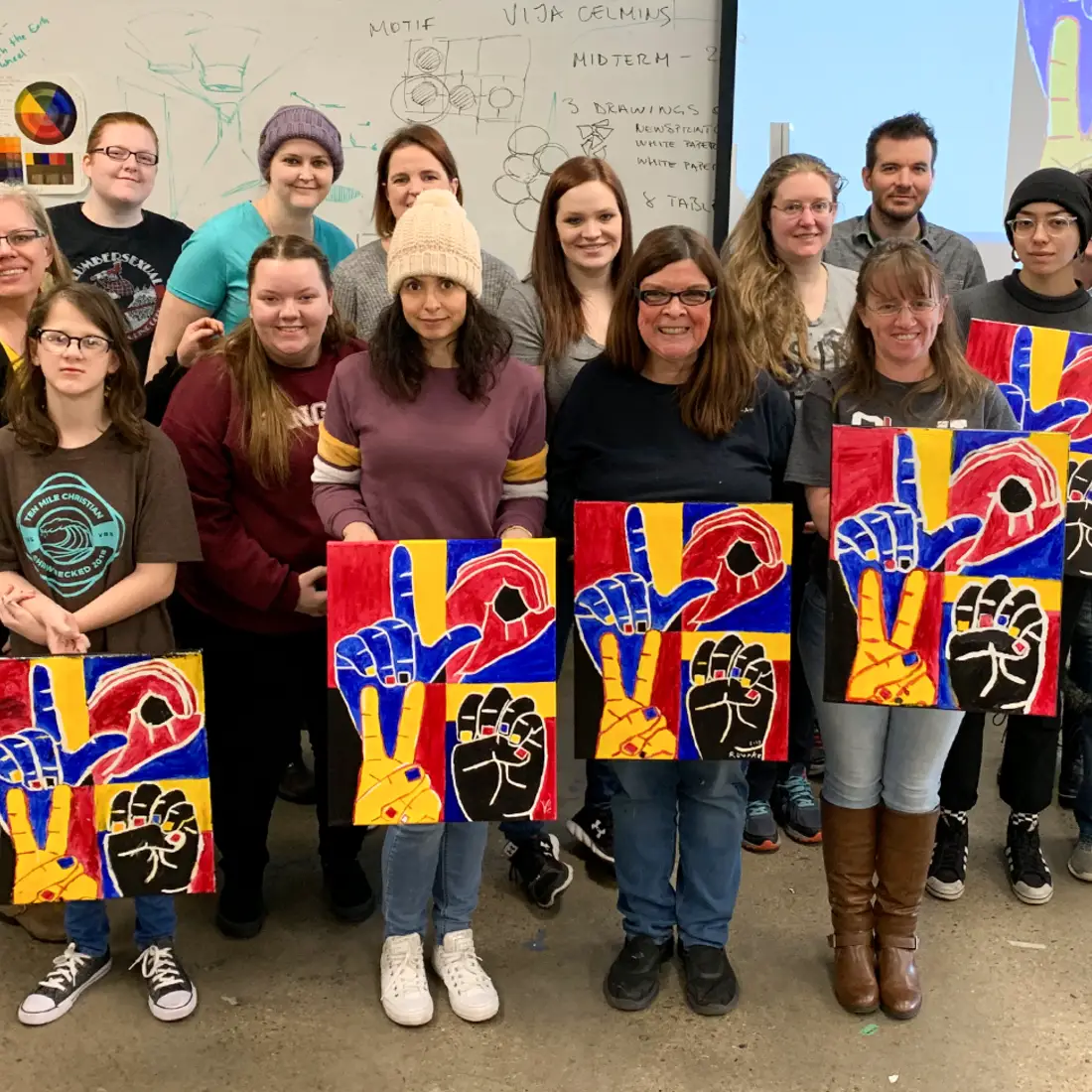 Students with internationally-know deaf artist, Nancy Rourke.