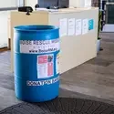 Barrel marked with Boise Rescue Mission signs