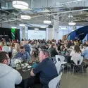 Tables of people in a banquet hall