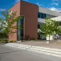 Exterior view of Nampa Campus Academic Building in the summer