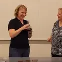 Two faculty members making agar