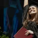 Student on stage at commencement
