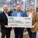 Mike Pena, Jeff Newgard, and Gordon Jones hold Bank of Idaho check