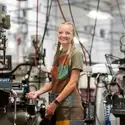 A portrait of a student machinist.