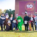 Employees dressed up in Halloween costumes outside the Nampa Campus Academic Building