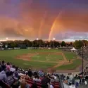 Boise Hawks baseball field with a double rainbow in the sky