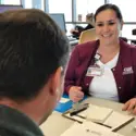 Nursing student registering a student to donate blood during a blood drive