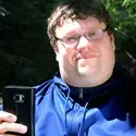 Casey Bosse, CWI student with his cell phone