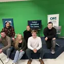 CWI Multimedia class sitting in front of game show set
