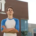 Student standing outside the Nampa Campus Academic Building