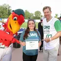 Humphrey the Hawks with SCORE Big Scholarship recipient, Madigan Grigsby, and President Gordon Jones