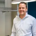 Michael Keller stands for a photo