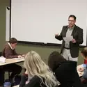 Ryan Witt teaching in front of a class