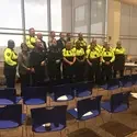 Officers at the community policing event presented by the U.S. Attorney’s Office and the U.S. Marshal’s Office