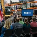 Governor Little speaking in front of audience at CWI