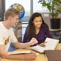 Students studying at table