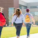 Students walking to the Nampa Campus Academic Building