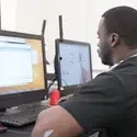student working on a computer