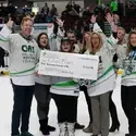 CWI staff, leadership, and students on the ice at Steelheads game