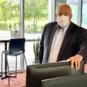 President Bert Glandon on campus wearing a mask