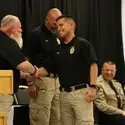 Law Enforcement students celebrate graduation with family and friends during a ceremony on May 16.