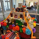 An alter display for Dia de los Muertos placed in lobby.