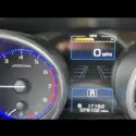 Dash of a vehicle showing mileage