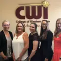 President Glandon and Dean Kelly Steely with new PTK officers