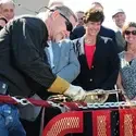 Randy Johnson cuts the ceremonial chain at the Micron Center for Professional Technical Education grand opening celebration.