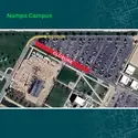 An aerial map shows an arrow indicating a road closure.