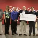 Idaho Steelheads present CWI Foundation with $500