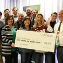 CWI representatives and members of the CWI Foundation Board and Board of Trustees pose with check for CWI Foundation