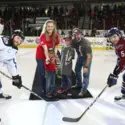 Puck drop by Tinker Family on the ice during CWI Night at the Idaho Steelheads