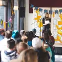 Catherine Kyle in front of an audience at Storyfort