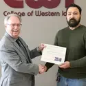 Daniel VanRenselaar, a veteran and Business major at College of Western Idaho, receives John McCain Memorial Award