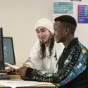 students working on computer
