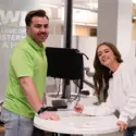 Staff helping a student at One Stop. 