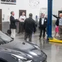 A group of Idaho State senators listen to a presentation from the CWI President about the Automotive Technology program.