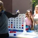 CWI Students playing connect four at Welcome Picnic