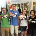 Students holding up their new CWI t-shirts from Student Orientation