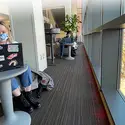 Students studying in common area at the Nampa Campus Academic Building