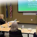 2015 graduate, Andde Mendez-Rhoades, speaks to members of the Idaho State Board of Education